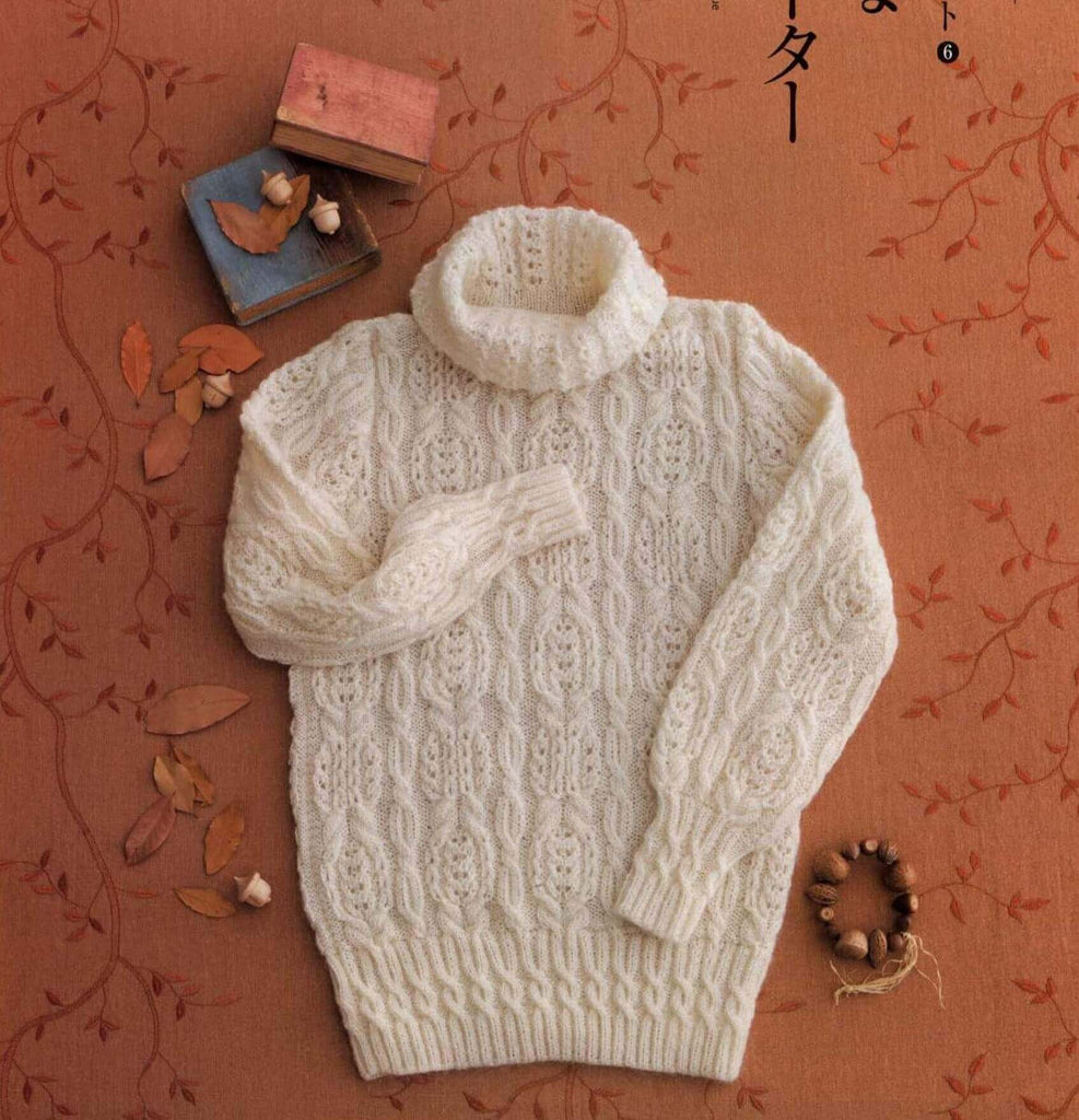 White women sweater wit arans and cables knitting pattern