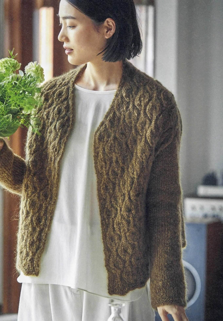 Elegant women light brown knitting jacket