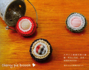 Crochet button brooch