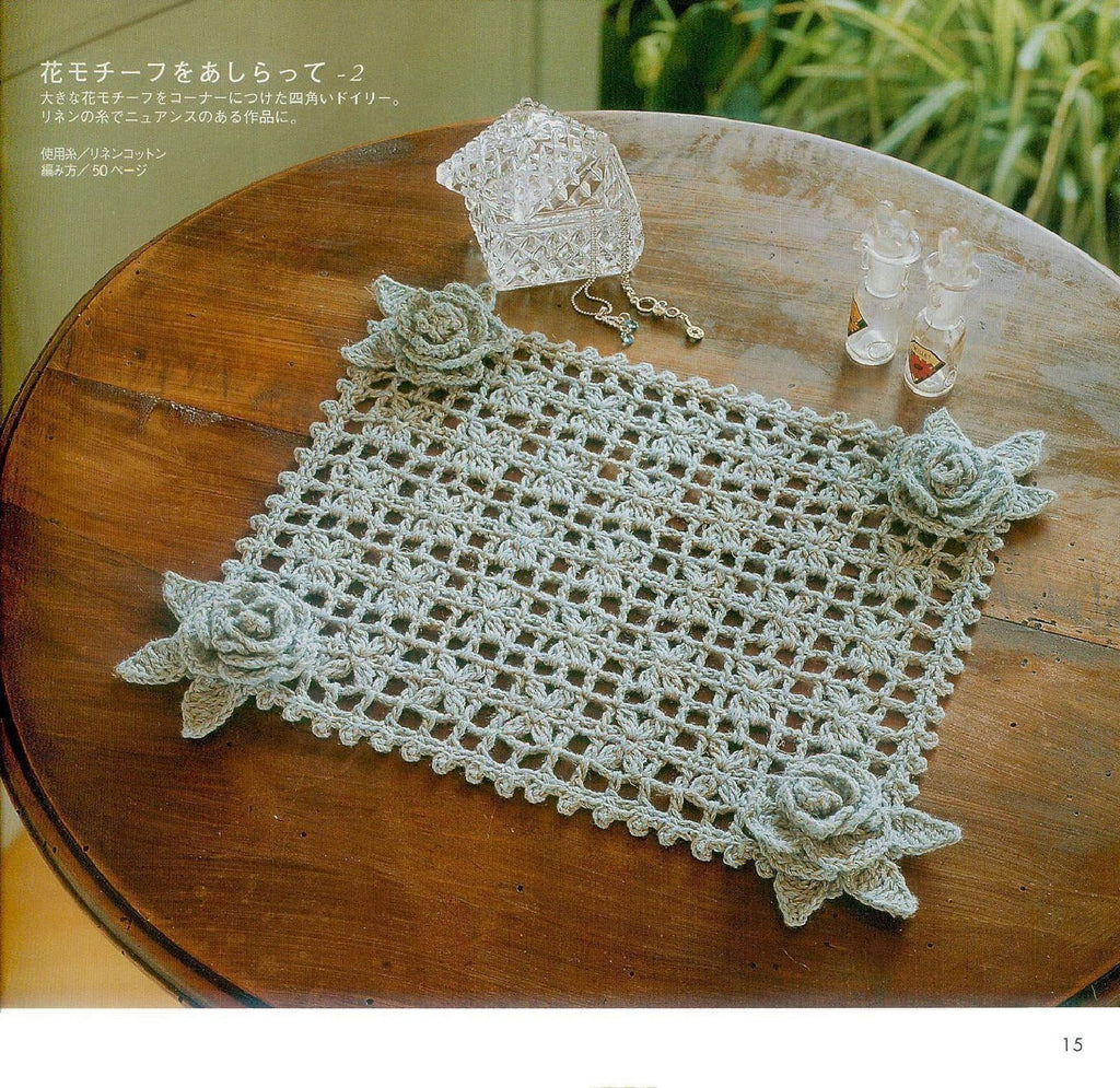 Filet crochet doily with rose flowers