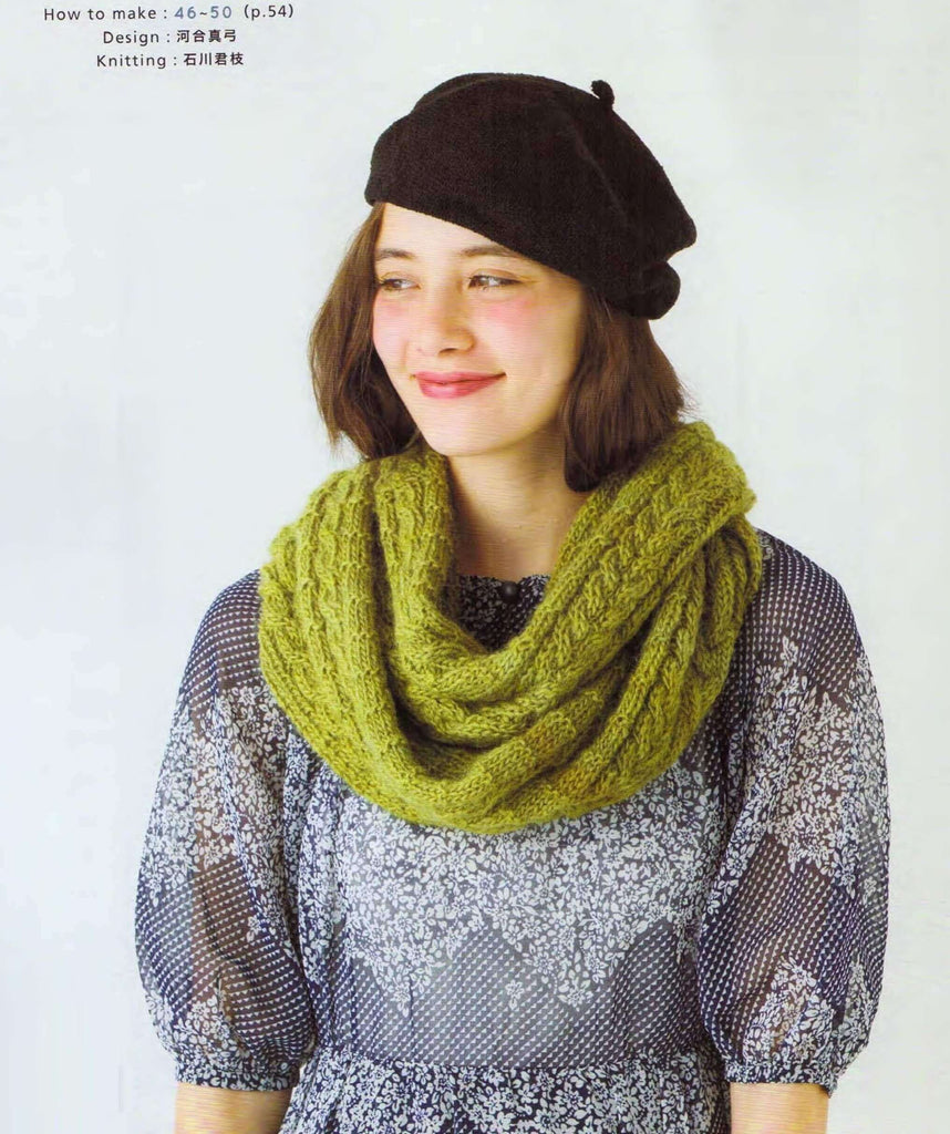 Green knitting scarf with arans