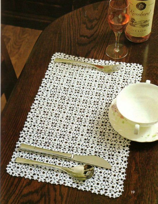 Small crochet motifs table mat
