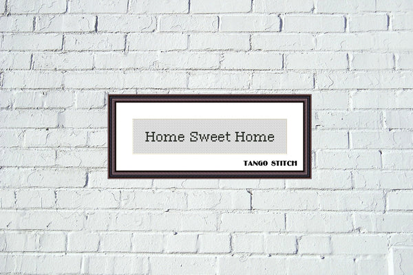 Framed artwork with 'Home Sweet Home' text on a white brick wall. About Simple small cross stitch font alphabet pattern, Tango Stitch