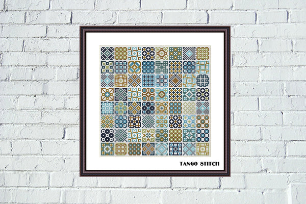 Framed artwork with geometric pattern on a white brick wall/ Blue gold granny squares ornaments sampler cross stitch pattern - Tango Stitch