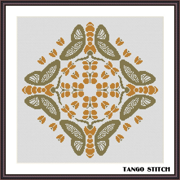 Decorative cross-stitch pattern with geometric design on a white background, branded 'Tango Stitch'. Dancing butterflies cross stitch pattern - Tango Stitch