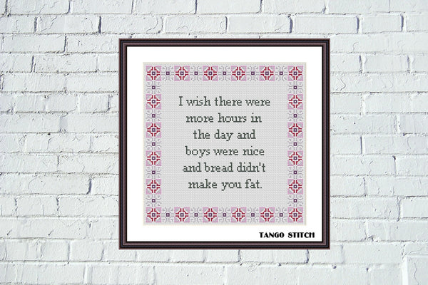 Framed cross-stitch art with humorous quote on a white brick wall. Funny wishes quote sassy cross stitch pattern - Tango Stitch