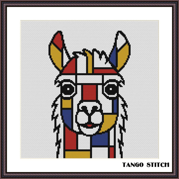 A framed cross-stitch design of a llama or alpaca face in a geometric, Piet Mondrian-inspired style. The design features blocks of red, yellow, blue, black, and white on a light gray fabric background. Mondrian Llama Geometric Alpaca Cross Stitch PDF Pattern - Tango Stitch