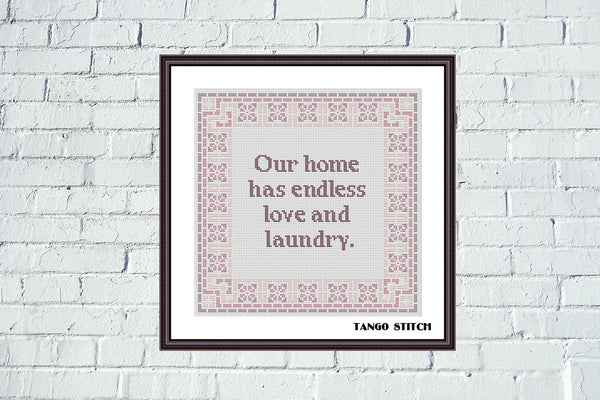 Framed cross-stitch art with text on a white brick wall background.Our home has endless love and laundry funny cross stitch pattern - Tango Stitch