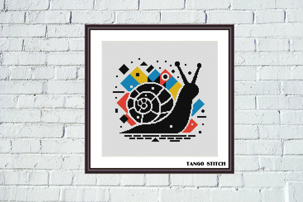 Framed artwork of a stylized snail with geometric patterns. Snail geometric cute animals Pop Art cross stitch pattern - Tango Stitch