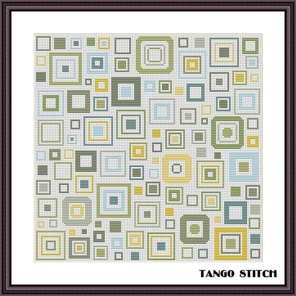 Cross-stitched pattern with geometric square design in various colors on a white background, framed by Tango Stitch. Geometric squares abstract cross stitch design, Tango Stitch