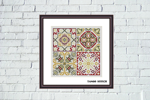 Framed cross-stitch pattern with geometric design on a white brick wall background. Mediterranean Ornament Cross Stitch Sampler - Tango Stitch